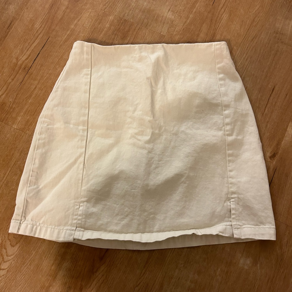 Brandy Melville cream mini skirt size small